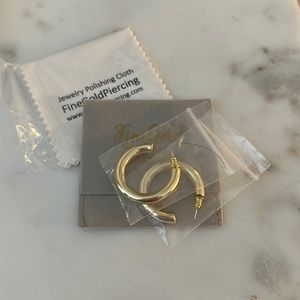 Brand new gold plated hoops .